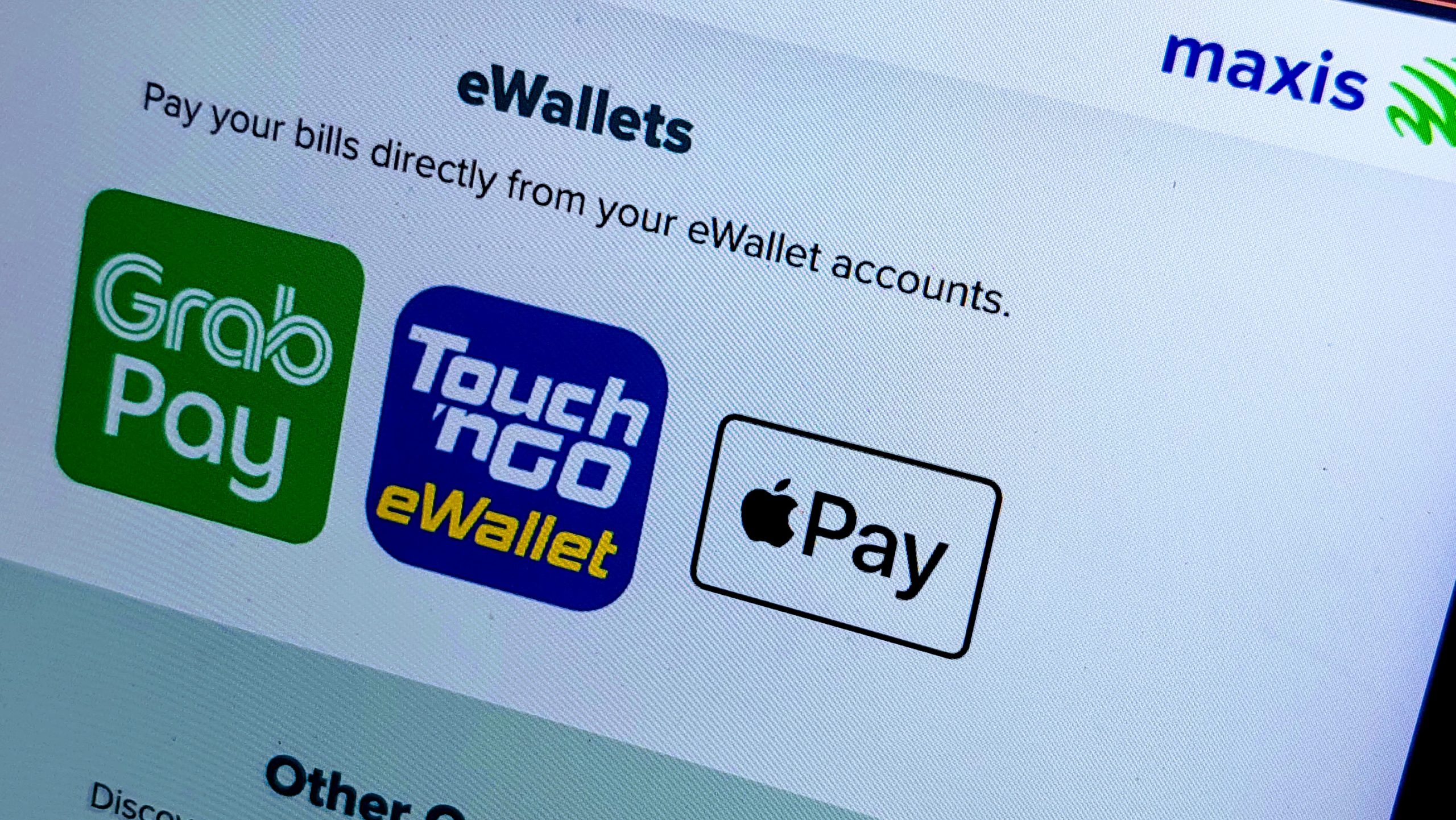 Maxis Menambah Logo Apple Pay Pada Laman Rasmi Sebagai Sokongan Mod Bayaran